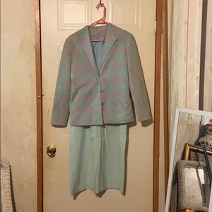 Vintage teal and pink blazer with a teal skirt